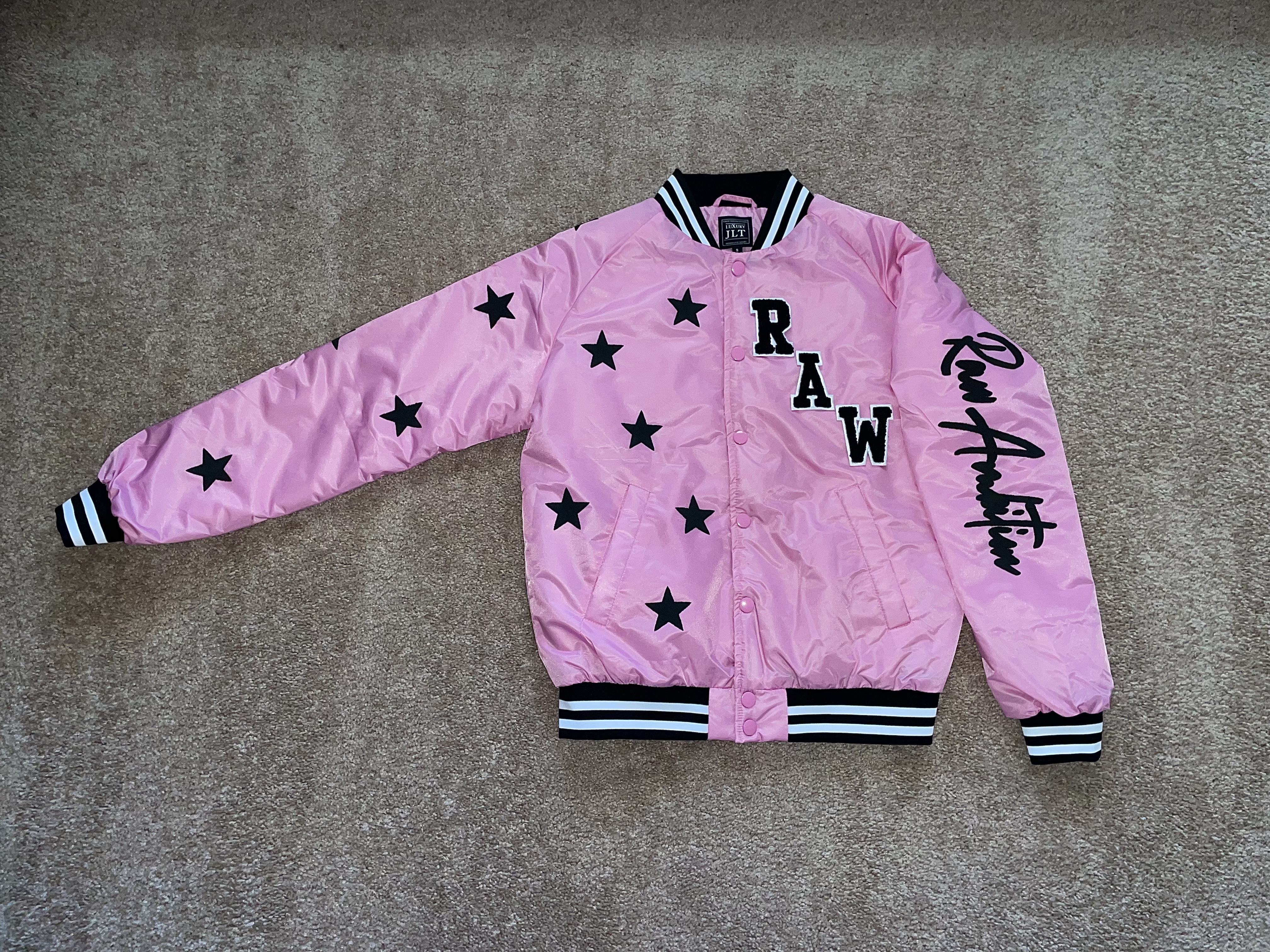 pink varsity jacket